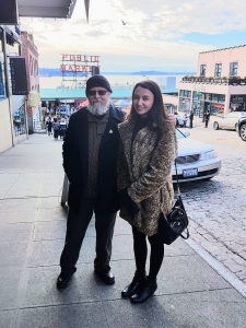 Rachel and HealthWell recipient Bob at Seattle's Pike Place Market.