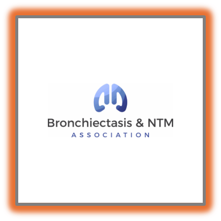 Logo of the Bronchiectasis & NTM Association featuring a stylized blue graphic resembling lungs above the association’s name in black and blue text on a white background.